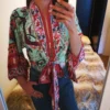S08218840f8d3421f9f9ade41ae200bc9X.webp Adventure Awaits Batwing Boho Kimono with Ties and Vibrant Patterns