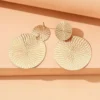 S0bebdb3eeb814a4b9b4dd920c3616c5ci.webp Golden Mirage Textured Disc Statement Earrings