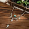 S0d7298db096947b0b30ac1bd440b89bdk.webp Santa Fe Layers Boho Layered Necklace with Charms