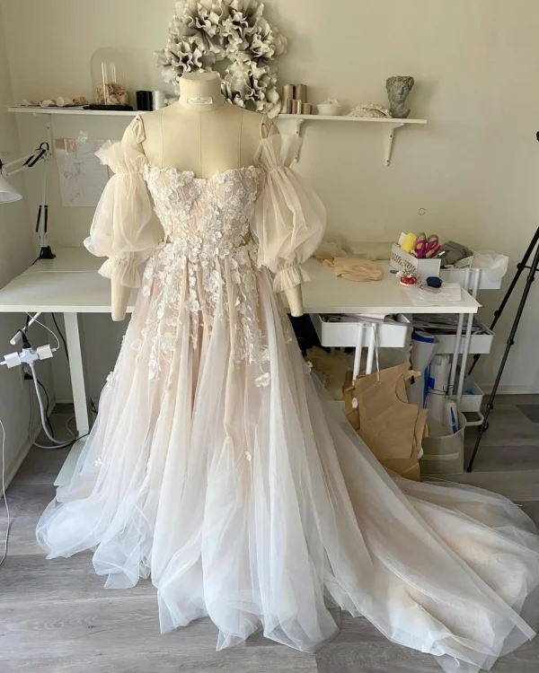 S0f3f06a401374f9299a27d57c2d0da60V.webp Romantic Pink Embroidered Bridal Gown with Floral Accents
