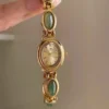 S0f79c776f0d445ac85e81afd89c4a0e6a.webp Elysian Gemstone Embellished Wristwatch with Bracelet Strap