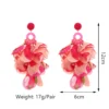 S1166995dc3984380906330b83b246ffdW.webp Radiant Blooms Floral Statement Earrings with Layered Petals