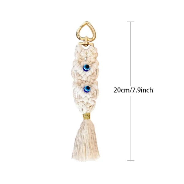 S13532cf7a913480589007f93f9c5f9bed-1.webp Boho Evil Eye Crochet Keychain Bag Charm with Tassel Detail White – Spirit & Rebel
