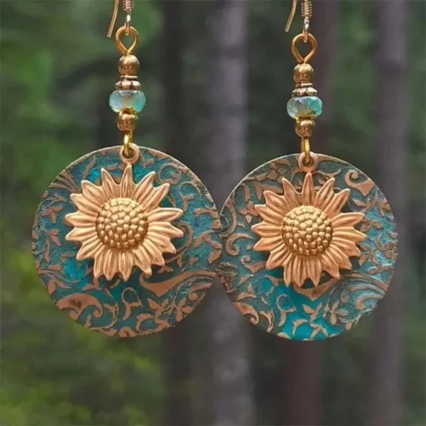 S13eb69af028b4ebdab2ebc03a3f96365y.webp Sunlit Garden Boho Earrings with Floral Accents and Textured Discs
