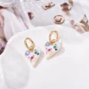 S143ad86475274343945bfabf4093c998X.webp Beautiful Heart Evil Eye Charm Earrings