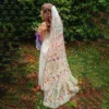 S172e51f2a14442579e78831ac59019951.webp The Honeyblossom Veil, a wildflower wedding veil embroidered all over with poppies, daisies and ferns