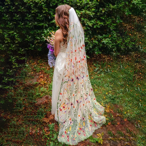 S172e51f2a14442579e78831ac59019951.webp The Honeyblossom Veil, a wildflower wedding veil embroidered all over with poppies, daisies and ferns