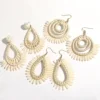 S175c4e7f31b64177a2cc9552a4697974X.webp Wild Shore sculptural raffia statement earrings in assorted woven shapes