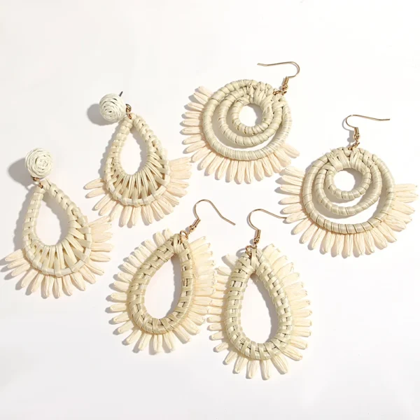 S175c4e7f31b64177a2cc9552a4697974X.webp Wild Shore sculptural raffia statement earrings in assorted woven shapes