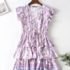 S18c14cebb7ad44eaac0bbe3f15cb2169Z.webp Floral Ruffle Mini Dress with Relaxed Fit and Button Detail