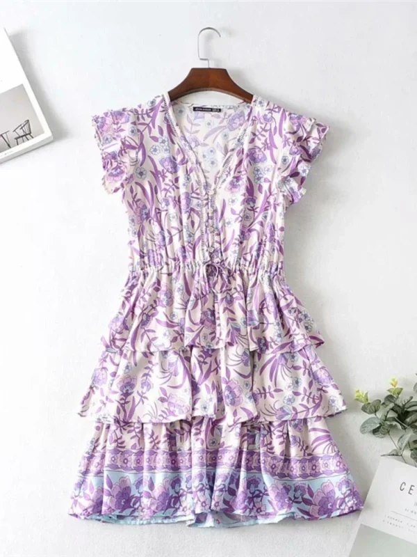 S18c14cebb7ad44eaac0bbe3f15cb2169Z.webp Floral Ruffle Mini Dress with Relaxed Fit and Button Detail