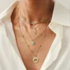 S18d3aee6357345f59e5c17036329e8f6l.webp Elements Lost and Found Gold Layered Necklace with Turquoise Details