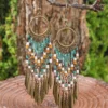 S1b58fb9d93a74abe80437bc3f1e7a09cP.webp Dream Big Boho Earrings with Cascading Beads and Leaf Accents