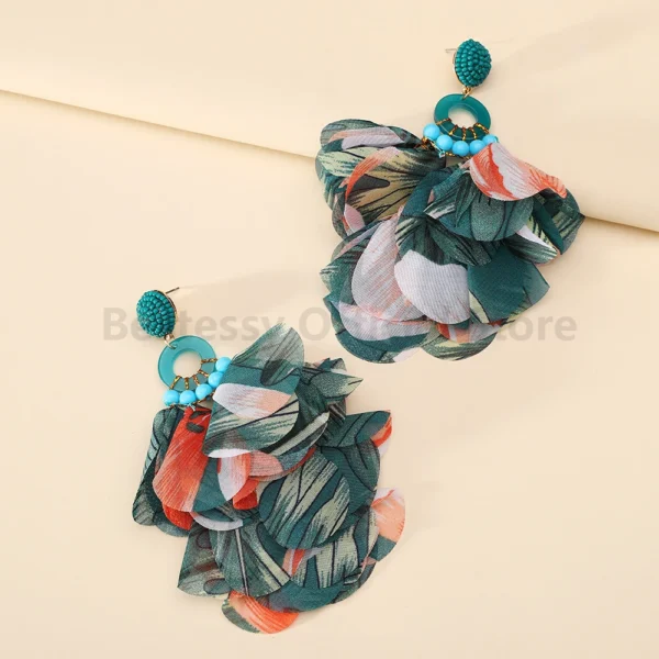 S1ff0c34569044f0a94e6b8b1685099e5k.webp Radiant Blooms Floral Statement Earrings with Layered Petals