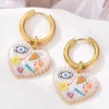 S26a2d32a8d3b43a09ce69d736b0e03cfP.webp Color Rush Artistic Hoop Earrings with Heart Dangles