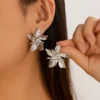 S28338063dcba44da8596b052c9429ec8O.webp Flower-Inspired Boho Ring with Textured Petals
