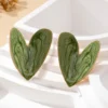 S290c1a39d4e846cbbcc6989778a54fbba.webp Sculpted Heart Statement Earrings