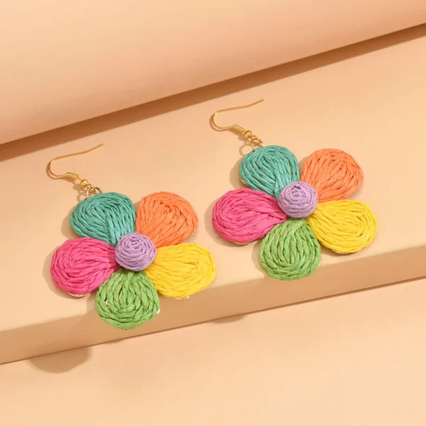 S30dad5928bc14c098ffd8bb74a1685c6j.webp Textured Hand-Woven Raffia Bloom Earrings