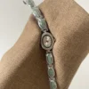 S325ad9001e9546519c8a565daf49b6c21.webp Elysian Gemstone Embellished Wristwatch with Bracelet Strap