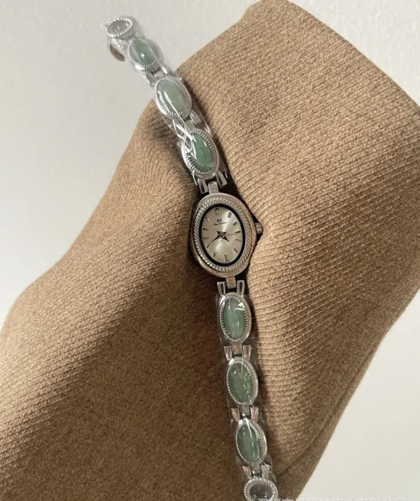 S325ad9001e9546519c8a565daf49b6c21.webp Elysian Gemstone Embellished Wristwatch with Bracelet Strap