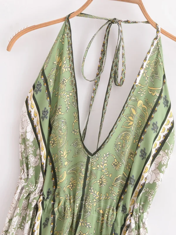 S33520a195f264c01bd553bfc3ad82285n.webp Desert Bloom: Floral Print Backless Halter Maxi with Tassel Hem