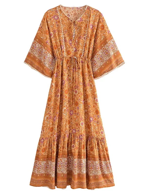 S36a78b46ce3c45729b7436a9f284b45b3.webp Free Spirit Bohemian Dress with Flowing Sleeves and Floral Detail