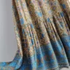 S36ccd73f68e94b9db09292cf25e6660ar.webp Free Spirit Bohemian Dress with Flowing Sleeves and Floral Detail