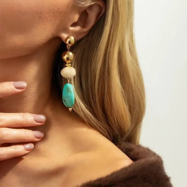 S3abda453eba34b4f8b58af9dfb8d21c1D.webp Boho Earrings with Bold Stone Accents and Gold Highlights