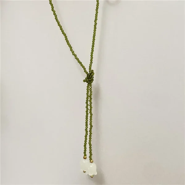 S3caec25f72b84442af61af02fa70cd996.webp Enchanted Lily Beaded Choker Necklace with Adjustable Length