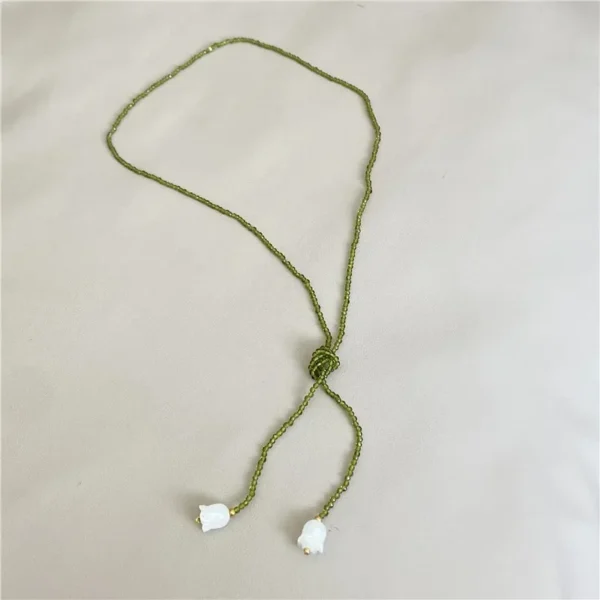 S3d54285ffabf410a80994c00ef280e61z.webp Enchanted Lily Beaded Choker Necklace with Adjustable Length