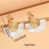 S43ca9035016e423980acfd99273c5d83E.webp Radiant Sunburst Tassel Statement Earrings