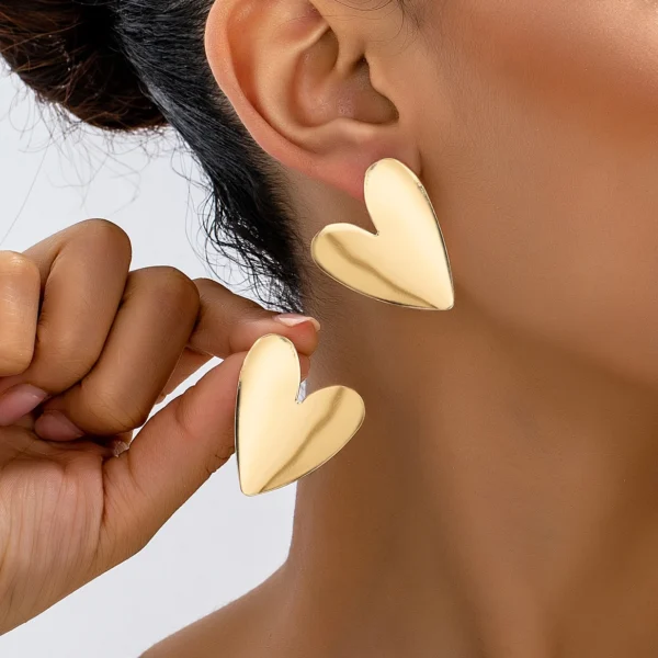 S44ac5de14f46417aaaa80ac5f78ea2cfI.webp Sculpted Heart Statement Earrings