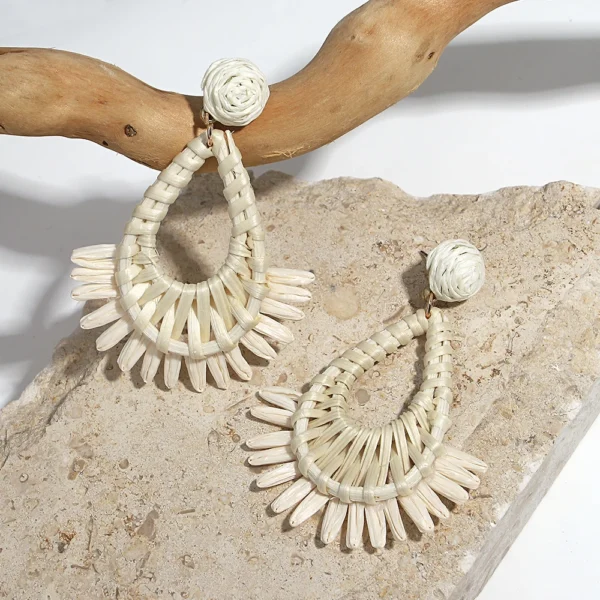 S46239ca9e04a4b8f8b378ebf4701a287t.webp Teardrop raffia statement earrings with wrapped rosette studs