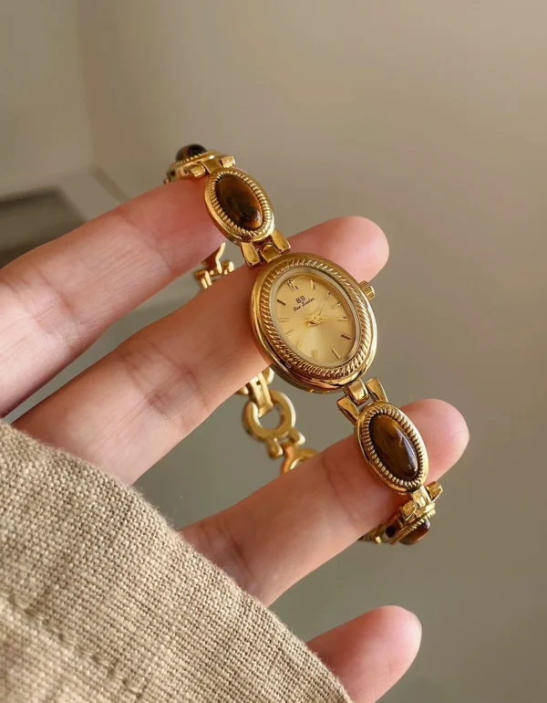 S4ba9f55c480d41e68b763065d2359e7d3.webp Elysian Gemstone Embellished Wristwatch with Bracelet Strap