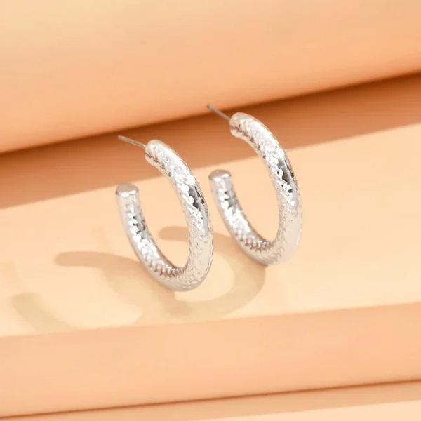 S4c27cfee4a474960bf3354ae57a5f8c5J.webp Irregular Crinkle Studs - Hammered Silver and Gold Earrings