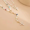 S4cc0ad72344040d7960b20626e2a8a25C.webp Eternal Radiance Layered Pearl Necklace with Cross Pendant