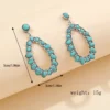 S4d08889cec0245eb8766df45fd7eba3ch.webp Intricate Silver Boho Earrings with Turquoise Accents