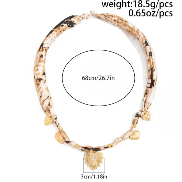 S4d78e6e6817f41a1b09ab48527a7a7c8M.webp Romantic Serenade Necklace Gold Heart Charm with Animal Print Ribbon