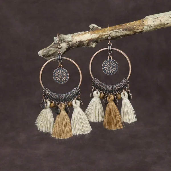 S4e6cb111e0c246f8a84b2a735717e2fcj.webp Odyssey Dangle Boho Tassel Earrings with Geometric Metal Accents