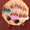 S4fcb5aaa110b4da2ada3d5bb423556ccq.webp Nomad Sun Feather Dreamcatcher Statement Earrings