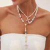 S5028b98a7dd242788f4e6c76d392c8dcS.webp Eternal Radiance Layered Pearl Necklace with Cross Pendant