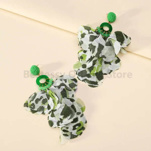 S503568ba36a14e2abd50e3a5130cd9cct.webp Radiant Blooms Floral Statement Earrings with Layered Petals