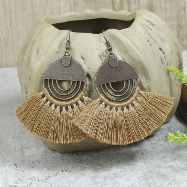 S506e1fd321cd45aab62df009d296dbcdv.webp Odyssey Dangle Boho Tassel Earrings with Geometric Metal Accents
