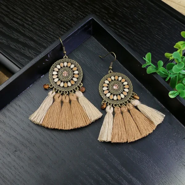 S54ee097491804a1a99cd7e43f2551b1aY.webp Odyssey Dangle Boho Tassel Earrings with Geometric Metal Accents