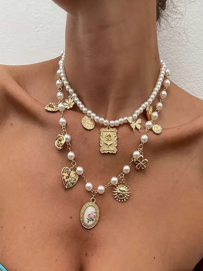 S56af11176ec04f75ba393dfe306baf31R.webp Vintage Allure Pearl Charm Layered Necklace