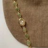 S57829e2a665542cbac1a50fc7d31c74ak.webp Elysian Gemstone Embellished Wristwatch with Bracelet Strap