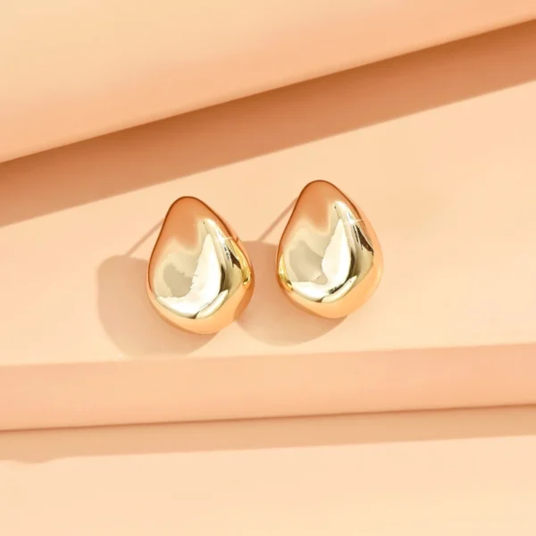 S57ed5c5056554de587d7c49ad5e1d6995.webp Irregular Crinkle Studs - Hammered Silver and Gold Earrings