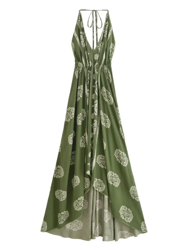 S5bd5a3850f8a4285b2fbfa172dd4fe417.webp Desert Bloom: Floral Print Backless Halter Maxi with Tassel Hem