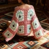 S5c490a9a38634ba2a00c9ee4d53e4a39k.webp Festival Finesse Tie-Front Boho Cardigan with Crochet Floral Details