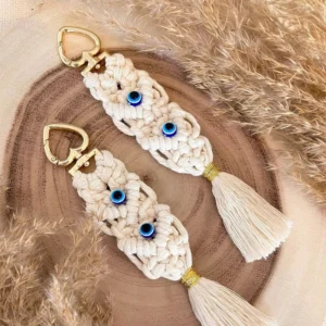 S5edc20a6bb9b423a88d55c8e0df812fbr.webp Boho Evil Eye Crochet Keychain Bag Charm with Tassel Detail